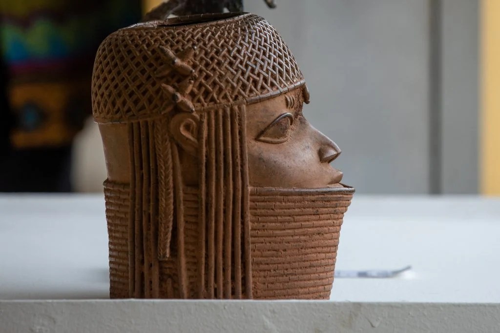Benin royal head displayed during the handover of 119 returned Benin objects in Lagos, June 2025