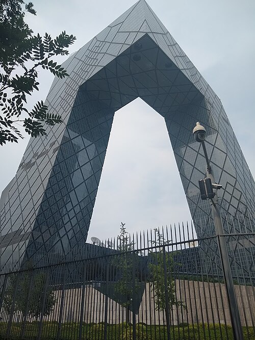 CCTV Headquarters in Beijing forming a dramatic three-dimensional loop above the city.