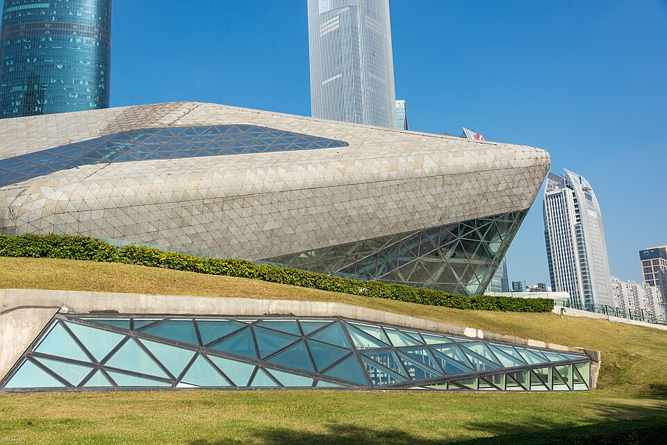 Guangzhou Opera House in Guangzhou, China, with its sculptural forms beside the Pearl River.